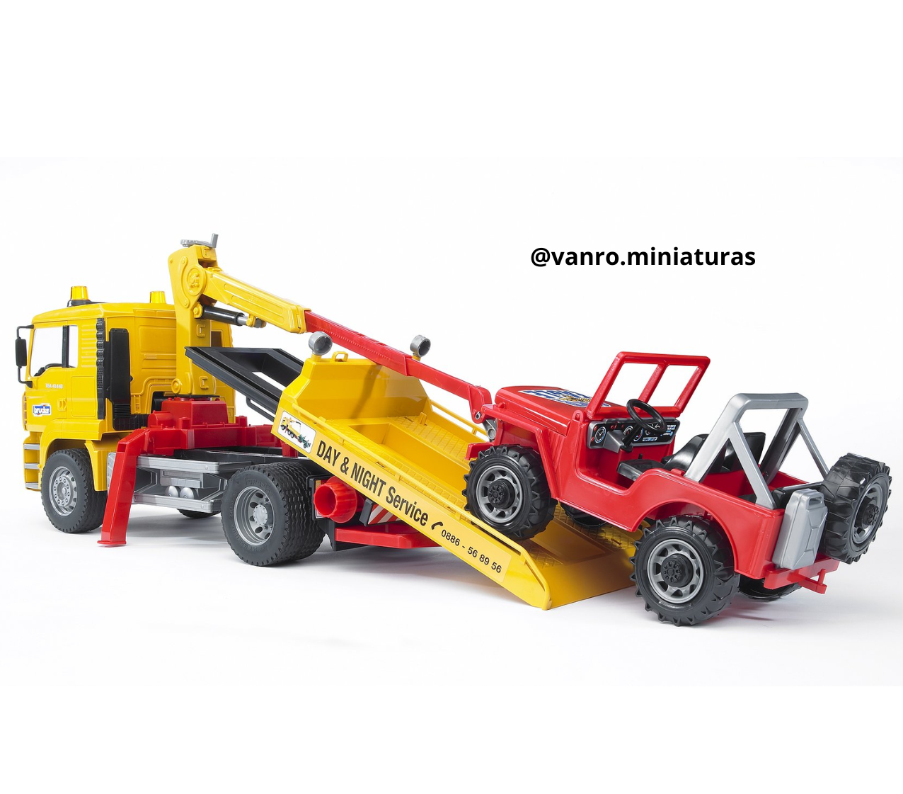 Camión MAN TGA c/ vehículo – Bruder Toys